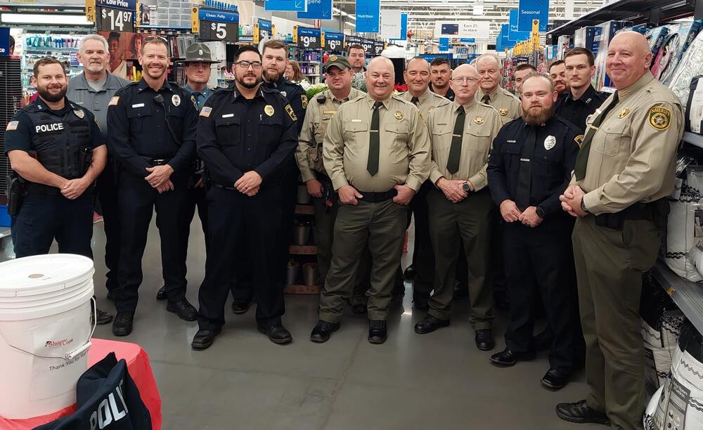 Shop with a Cop the Booneville Walmart Group Picture