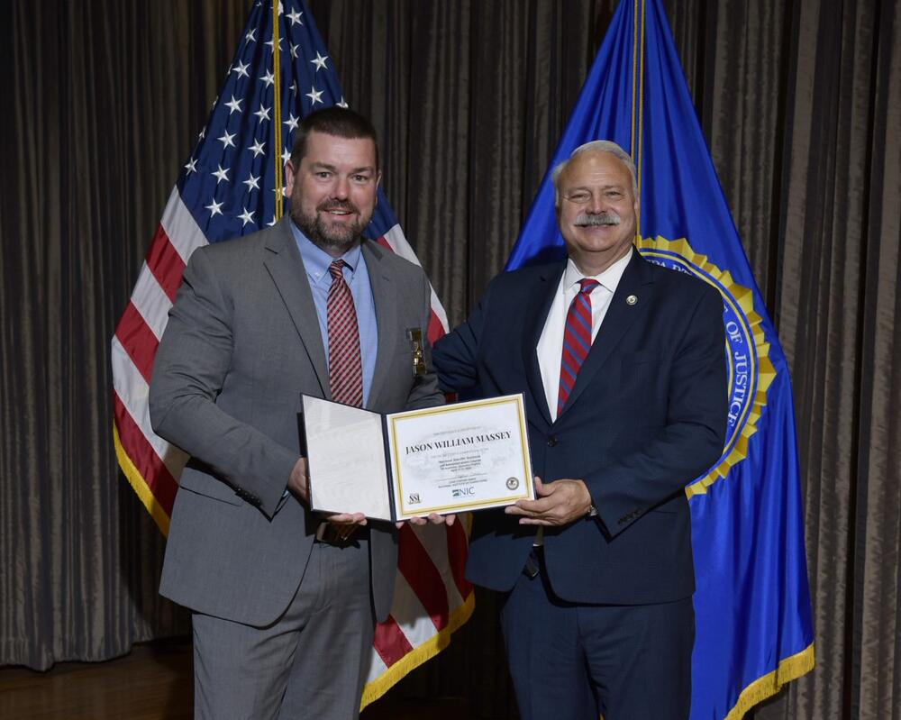 Sheriff Massey Receiving Certificate of Completion