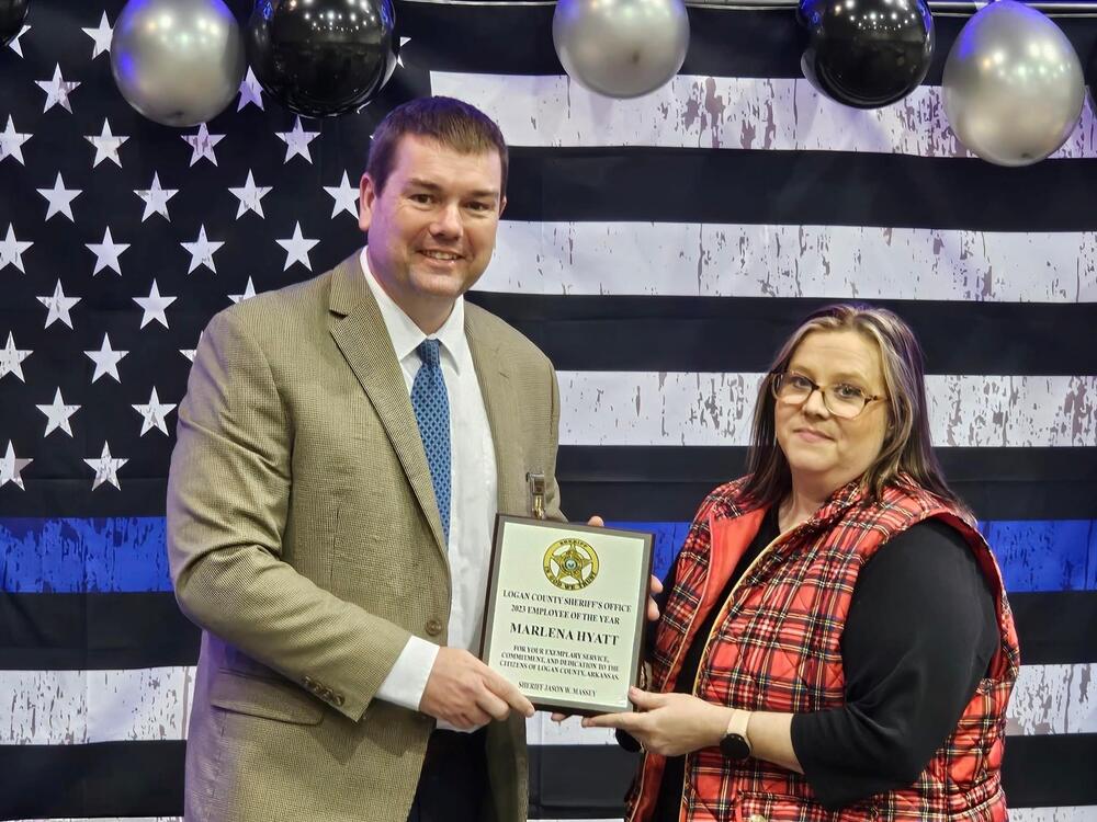 Photo of Marlena Hyatt receiving Award